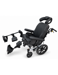 Invacare Rea Azalea Wheelchair with cheek support, tilted with legs raised.