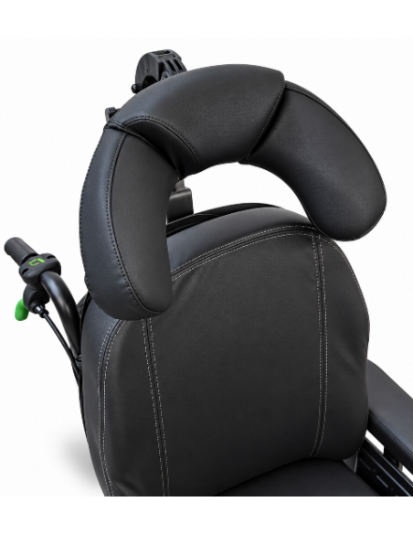 Invacare Rea Azalea fitted with cheek support headrest.