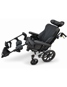 Invacare Rea Azalea wheelchair with Passad backrest cushion, tilted with legs raised.